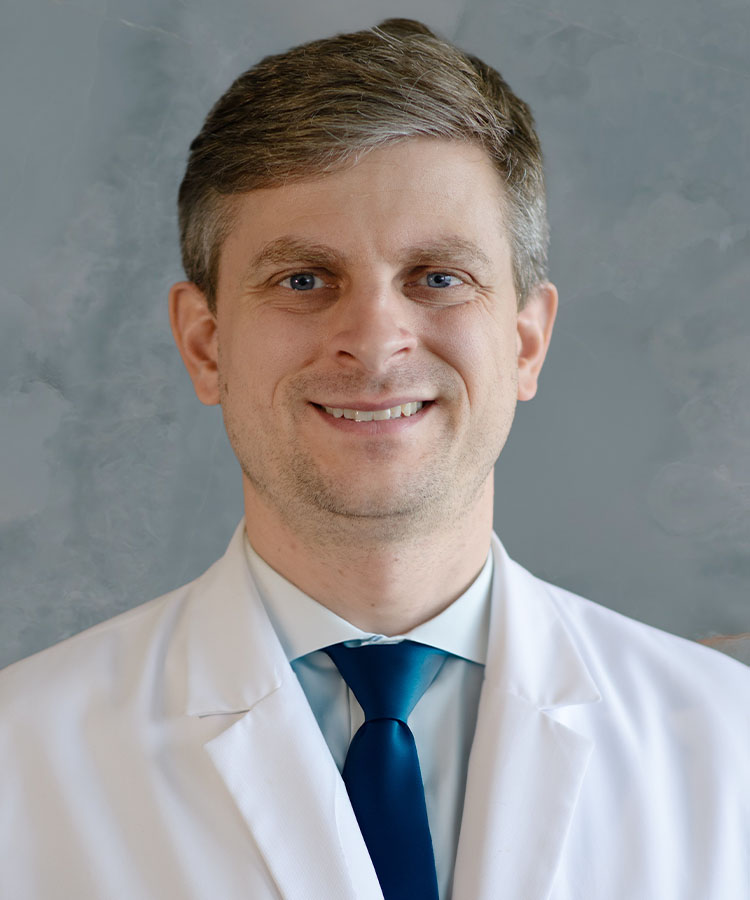 Joseph Christenbury, M.D., F.A.C.S.