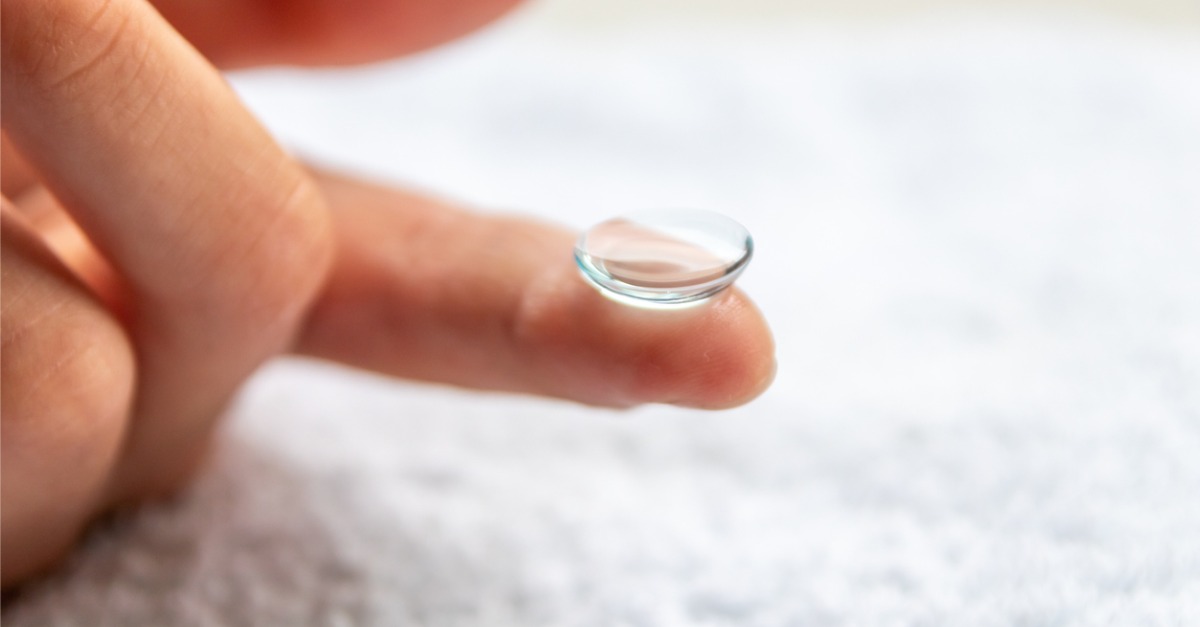 Contact lens on finger