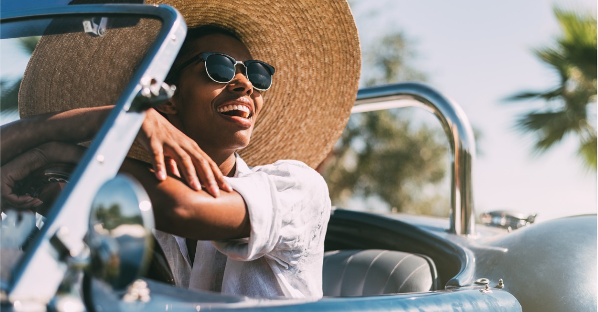 Woman smiling in car