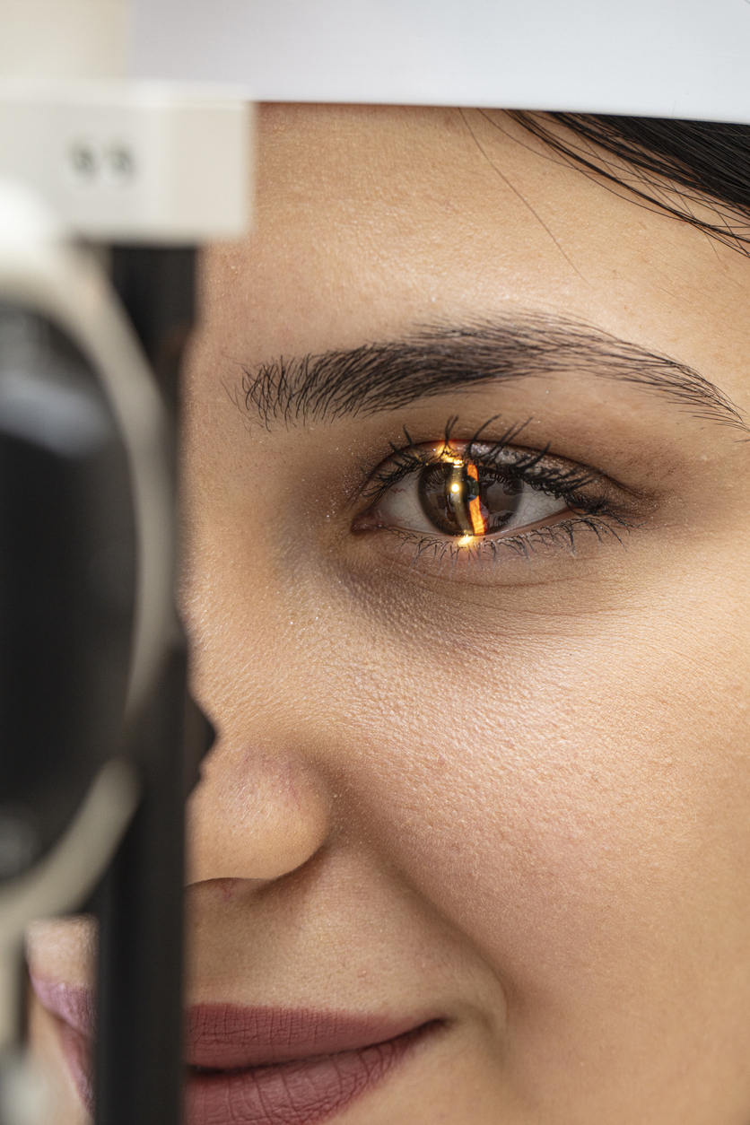 woman getting eye examined