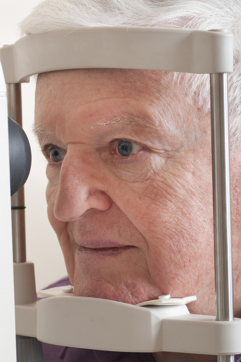 Senior man getting his eyes examined