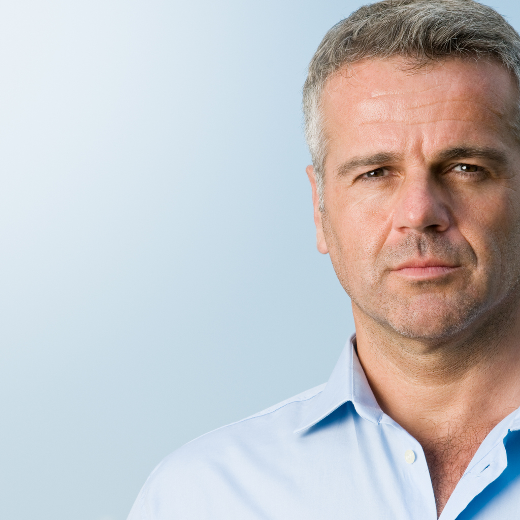 Close up portrait of serious mature businessman