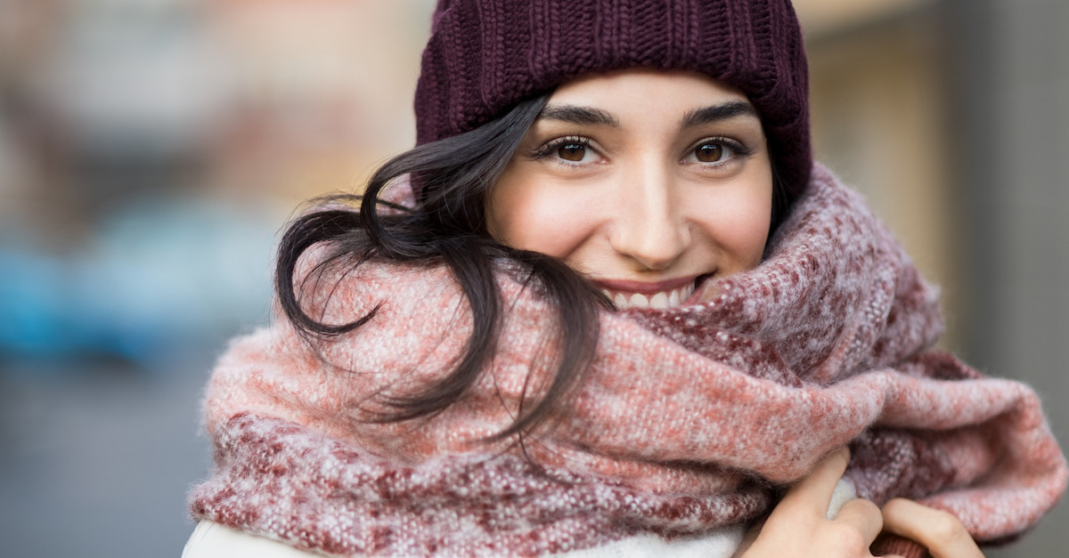 Woman wearing beanie and scarf